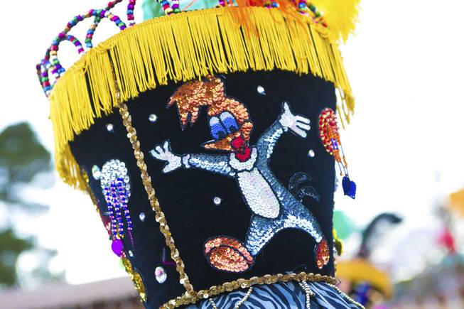 Beads and a sequenced Woody the Woodpecker decorate the side of this traditional Morelos, Mexico Chinelo, dancer, mask, Tuesday, Jan. 8, 2013. The "Comparza Morelense," a local Las Vegas cultural dance troupe, has been invited to perform at President Obama's inauguration parade on January 21.